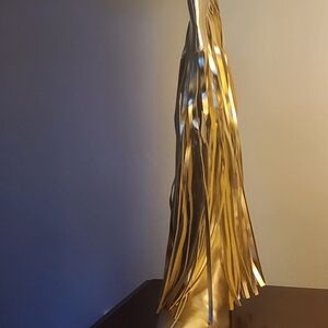 Heel frange boots, gold color. Man-made size 7.5